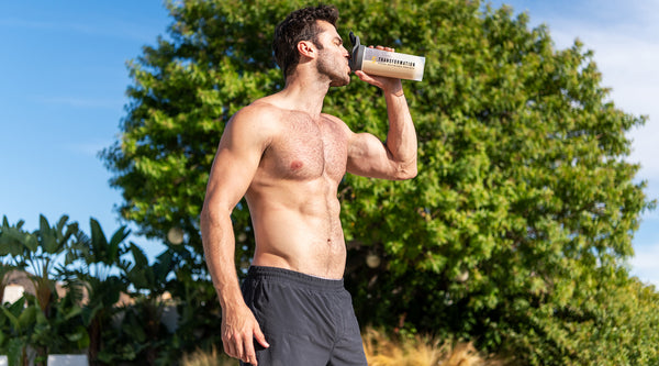 Man drinking Transformation Protein Powder